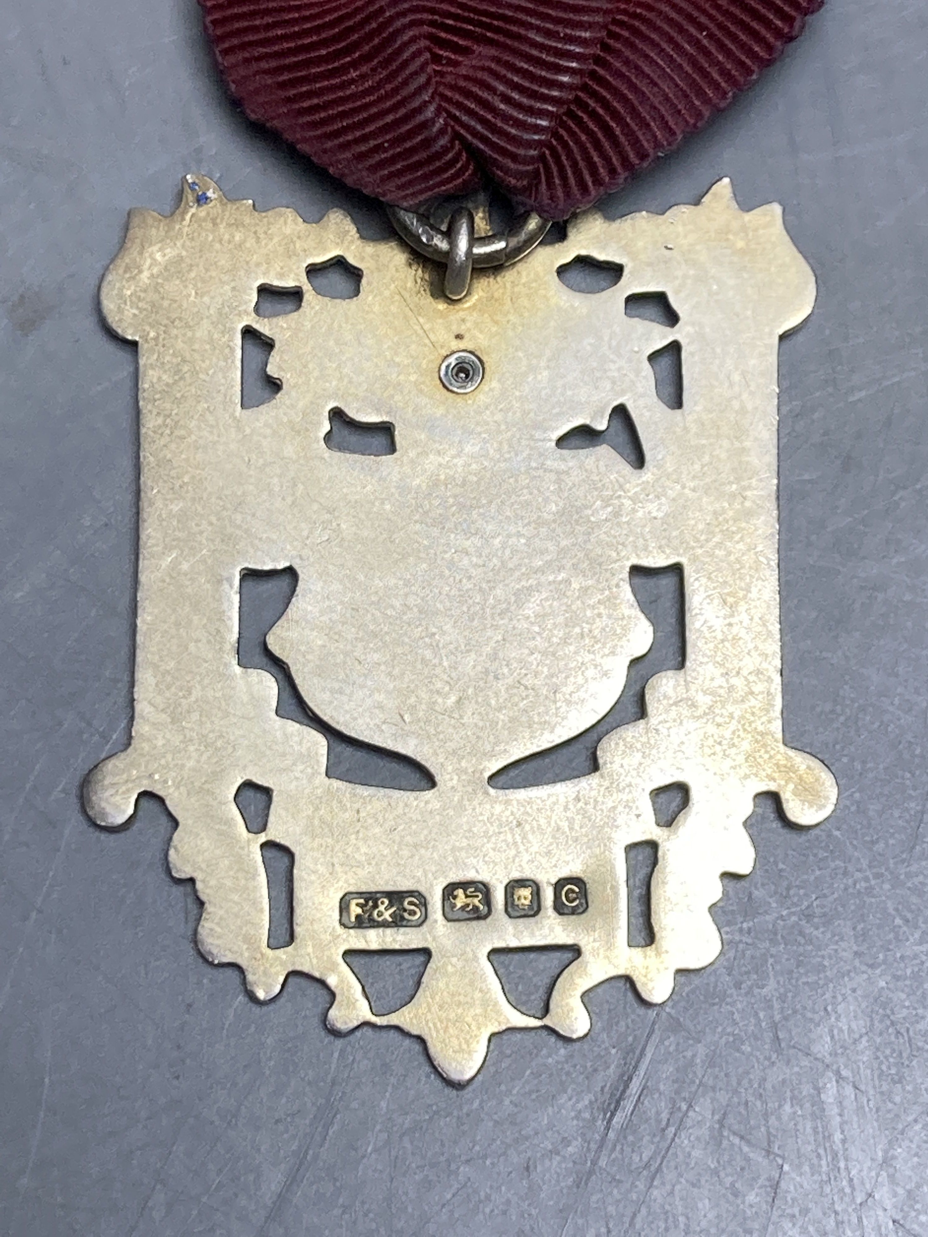 Six assorted early to mid 20th century silver and enamel masonic jewels,